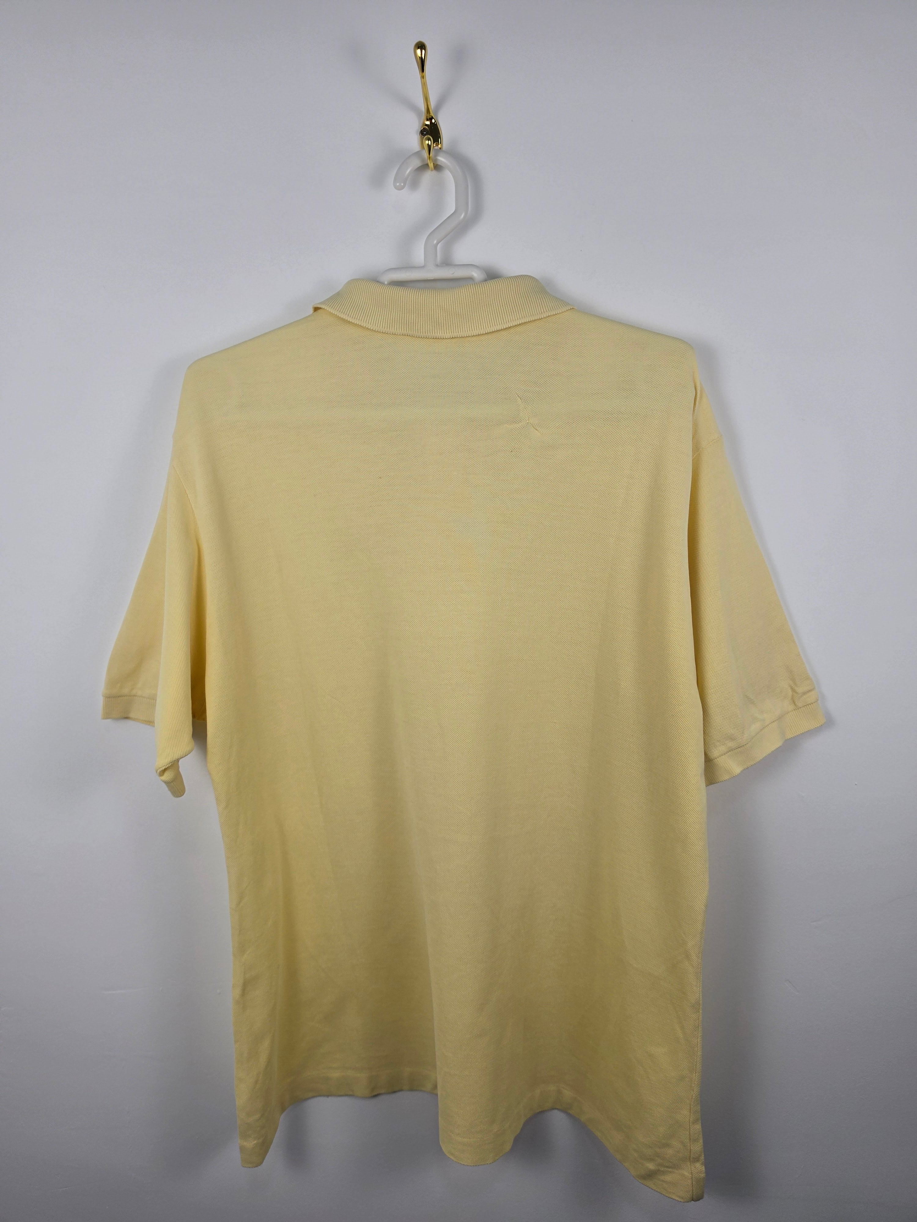 Polo Clásico Lacoste Amarillo Claro - Talla 7 (XXL) - Grado C (61x73) - Con Arreglo