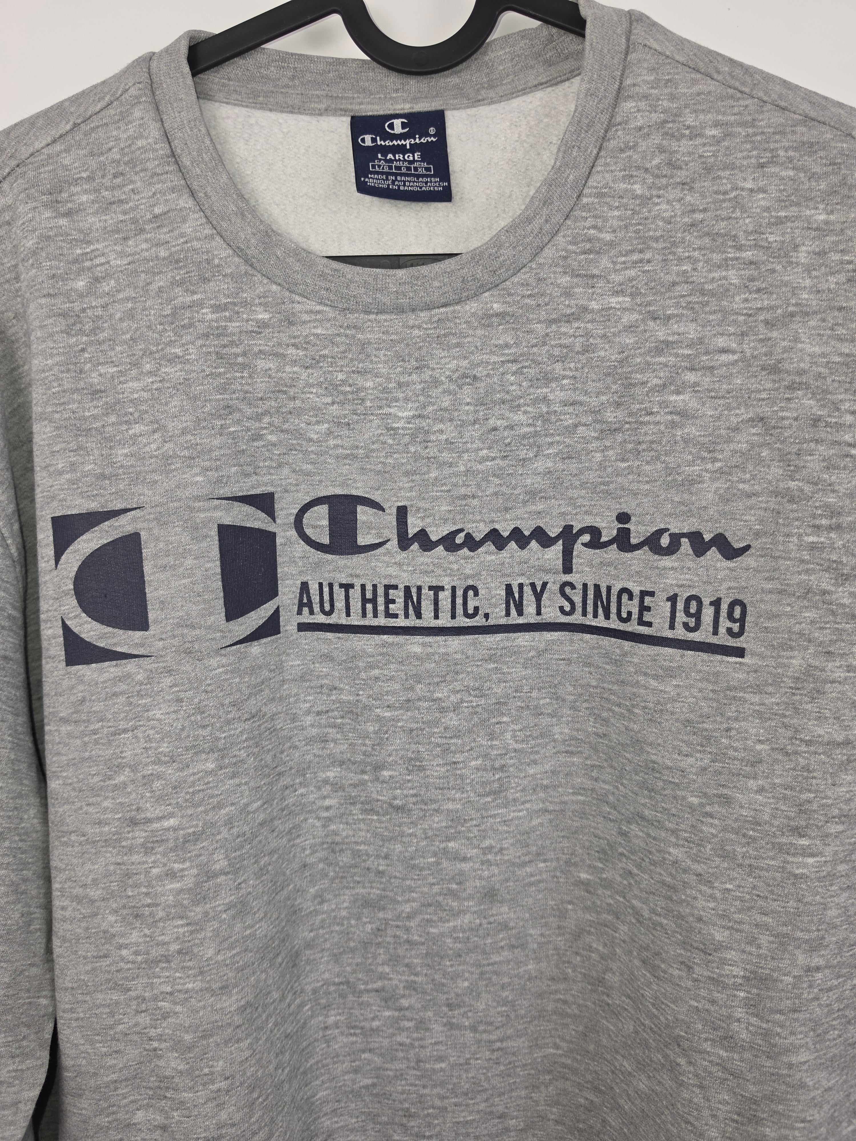 Sudadera Champion "Since 1919" - Talla L - Gris Melange - Grado A