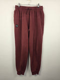 Pantalón Jogger Under Armour Mujer - Talla L - Granate - Grado A